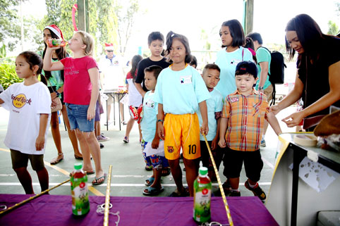 children living with HIV/AIDs were invited to CHRISTMAS FAIR at the Garden International School Ban Chang. 
